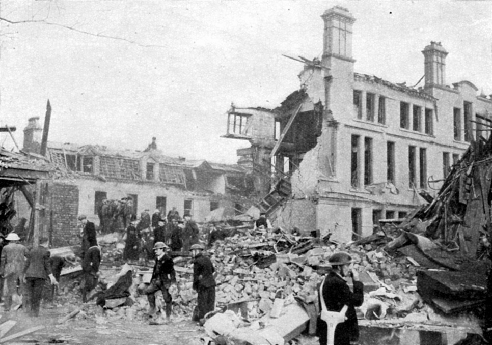 Rescue workers searching through wreckage, England, World War II, 1941